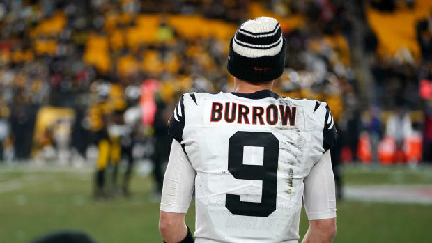 Nov 20, 2022; Pittsburgh, Pennsylvania, USA; Cincinnati Bengals quarterback Joe Burrow (9) watches the Pittsburgh Steelers offense from the bench in the fourth quarter at Acrisure Stadium. Mandatory Credit: Kareem Elgazzar-USA TODAY Sports-The Cincinnati Enquirer